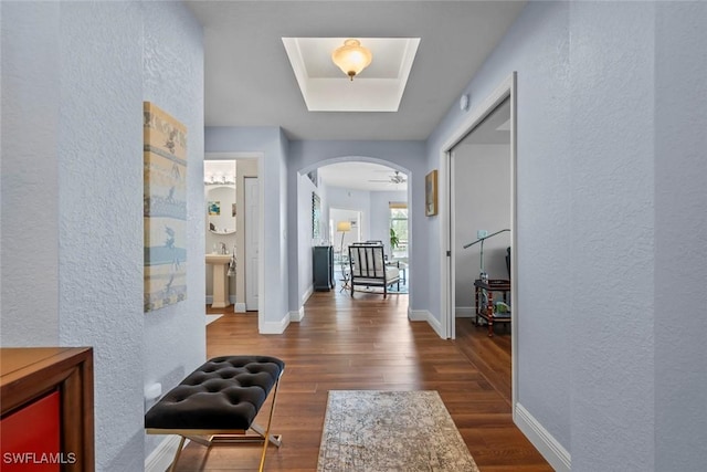 corridor featuring dark hardwood / wood-style floors