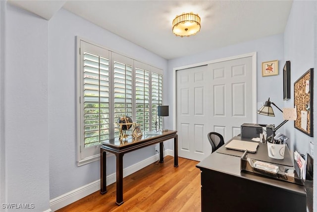 home office featuring light hardwood / wood-style floors