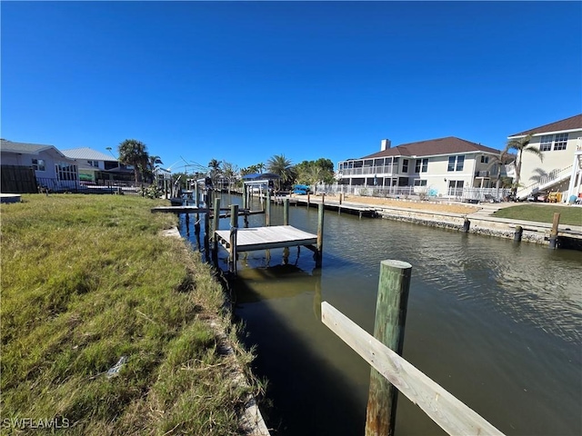 dock area featuring a water view