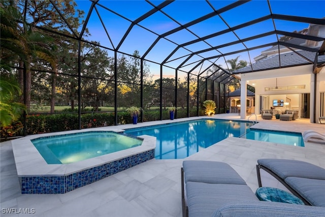 pool at dusk with ceiling fan, an outdoor living space, a lanai, and a patio area