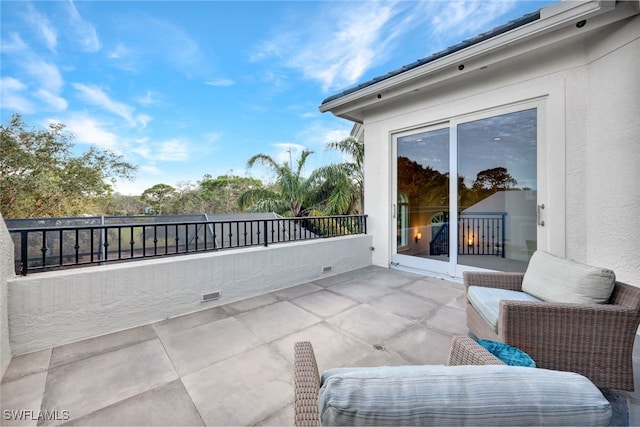 view of patio / terrace featuring a balcony