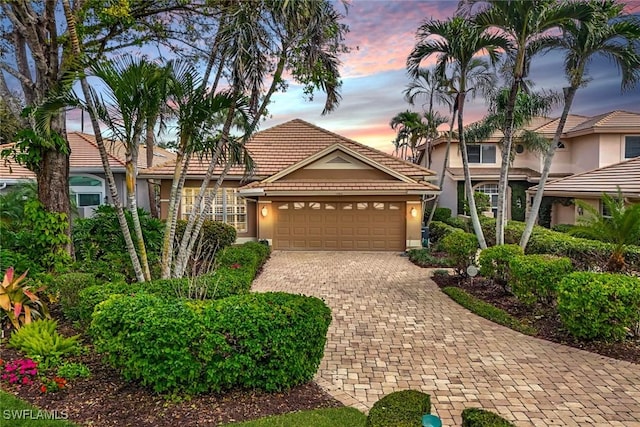 view of front of home with a garage