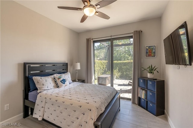 bedroom featuring access to exterior and ceiling fan