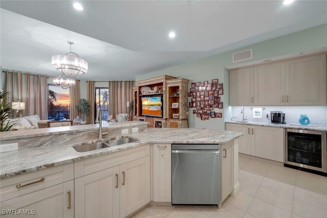 kitchen with wine cooler, sink, hanging light fixtures, dishwasher, and light stone countertops