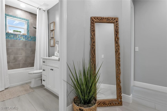 full bathroom with tile patterned floors, vanity, toilet, and shower / tub combo