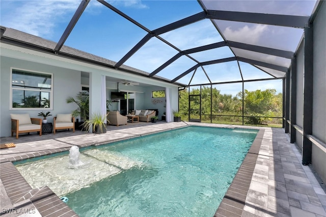 view of pool with ceiling fan, an outdoor hangout area, glass enclosure, and a patio