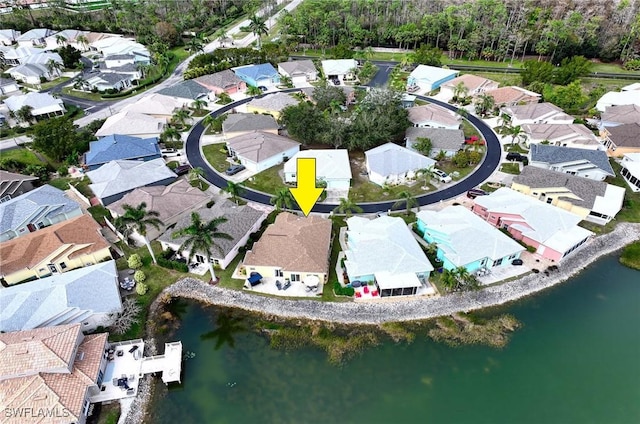 aerial view featuring a water view and a residential view