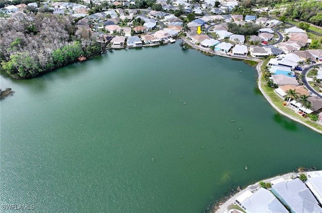 aerial view with a water view and a residential view