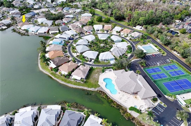 aerial view featuring a water view and a residential view