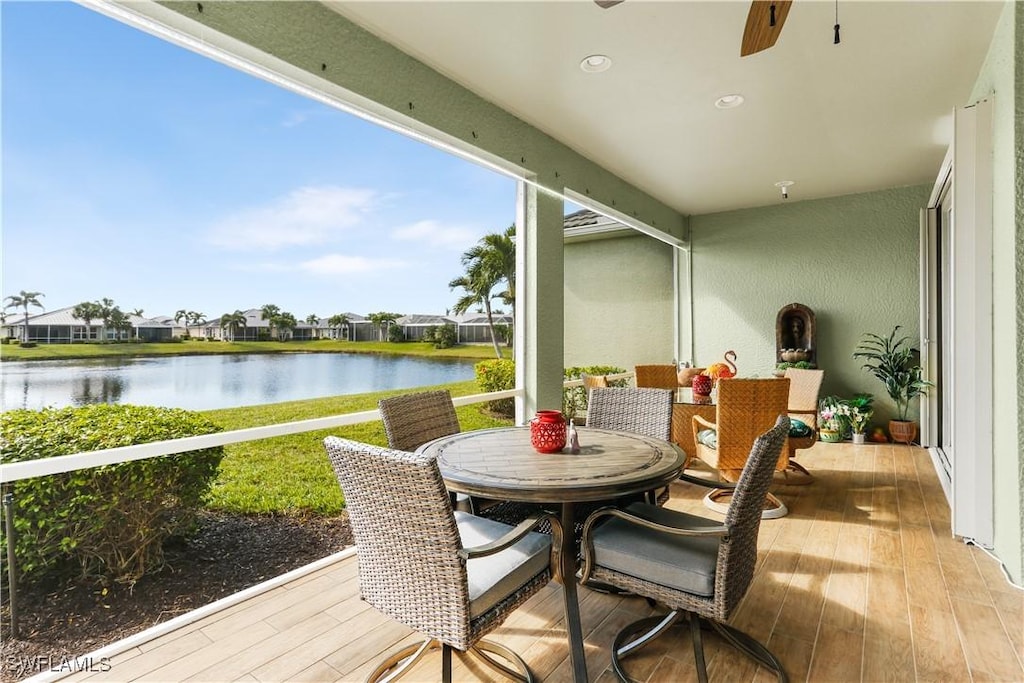 2636 Casibari Ct, Cape Coral, FL 33991 - sunroom featuring a water view and ceiling fan
