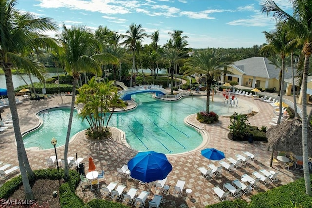 view of swimming pool with a patio area