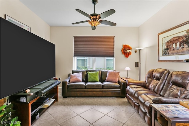 living room with light tile patterned floors and ceiling fan