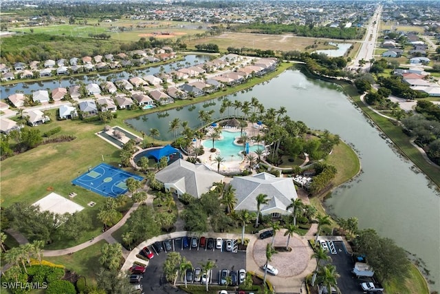 birds eye view of property featuring a water view