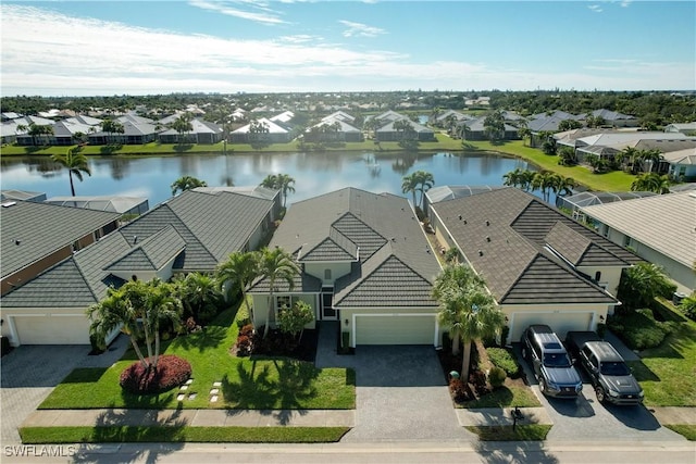 bird's eye view with a water view