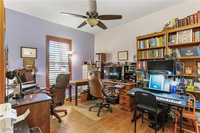 office featuring ceiling fan and hardwood / wood-style floors