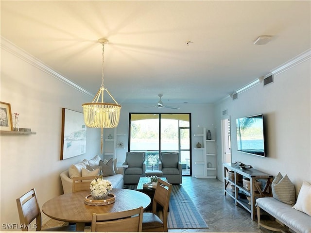 living room featuring crown molding and ceiling fan with notable chandelier