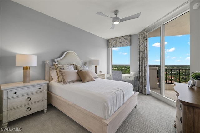 bedroom with ceiling fan, light colored carpet, and access to outside