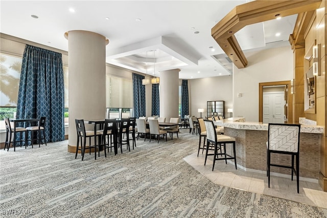 dining area with ornate columns