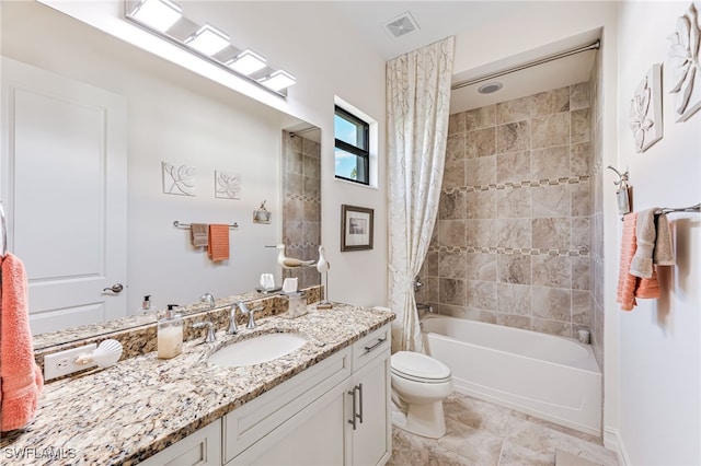 full bathroom featuring vanity, toilet, and shower / bath combo