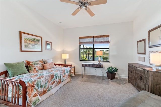 bedroom with ceiling fan and light colored carpet