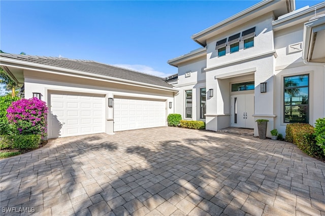 view of front of house with a garage