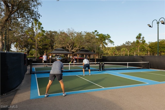 view of sport court with a gazebo