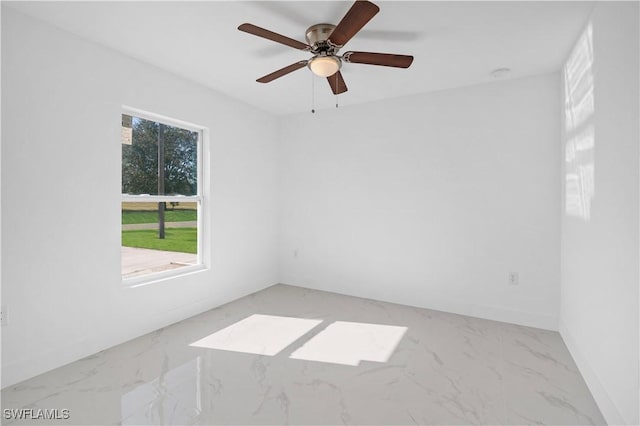 unfurnished room with ceiling fan