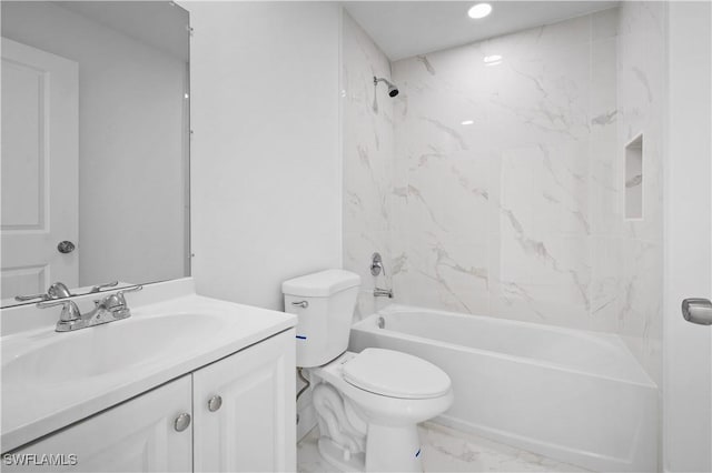 full bathroom with tiled shower / bath, vanity, and toilet