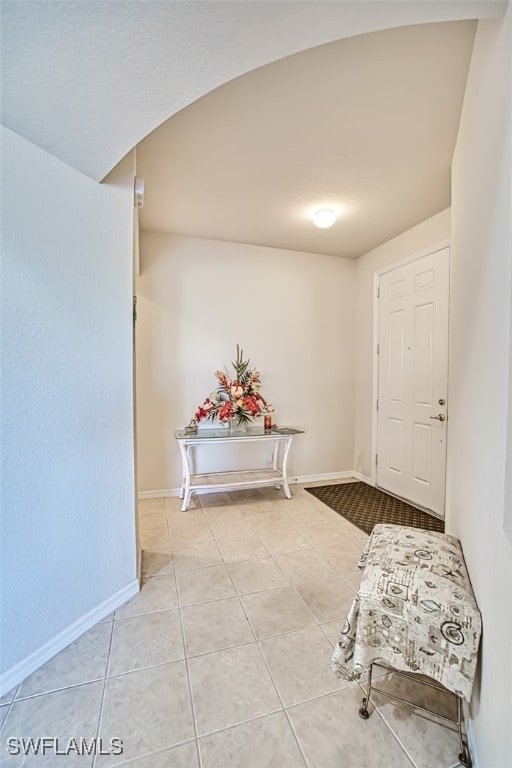 hall featuring tile patterned floors