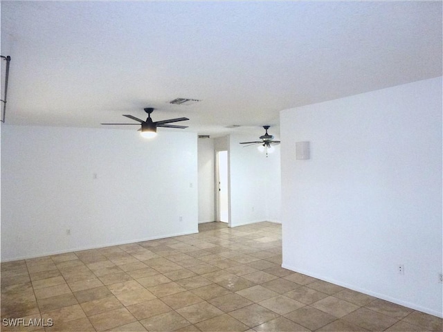 spare room featuring ceiling fan