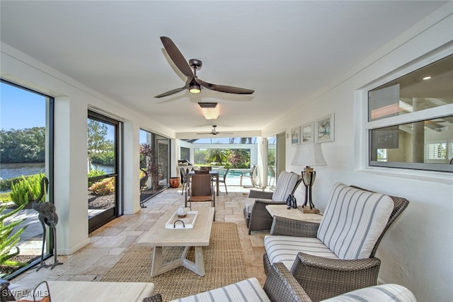 sunroom with a water view