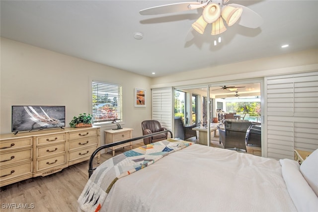 bedroom featuring ceiling fan, access to outside, and light hardwood / wood-style floors