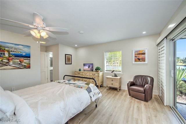 bedroom with ceiling fan, access to exterior, and light hardwood / wood-style floors