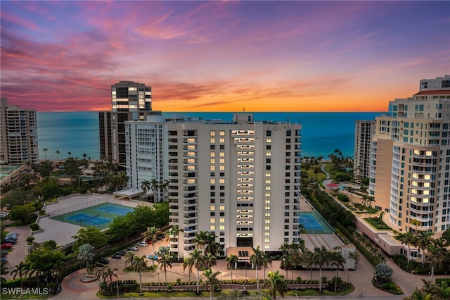 outdoor building at dusk with a water view