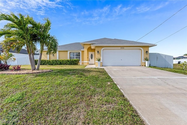 ranch-style home with a garage and a front yard