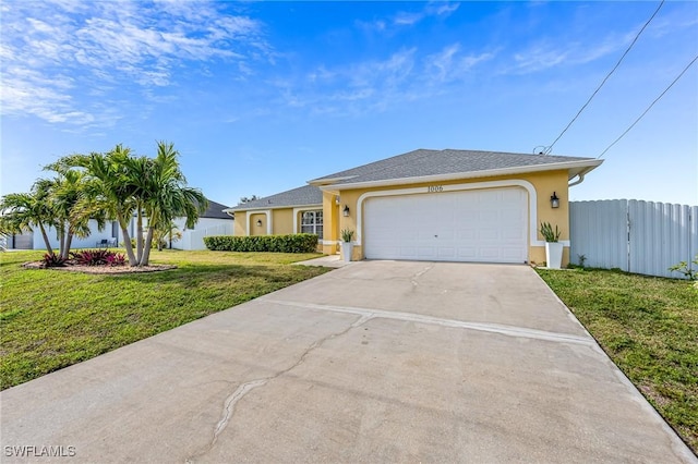 ranch-style house featuring a garage and a front yard