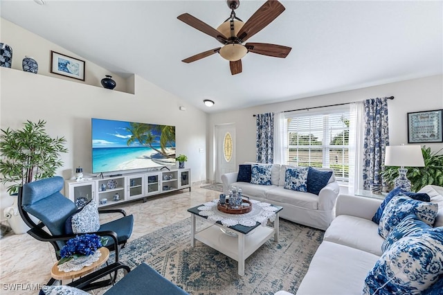 living room with ceiling fan and lofted ceiling