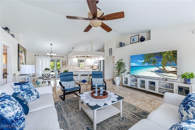 living room with ceiling fan with notable chandelier and vaulted ceiling