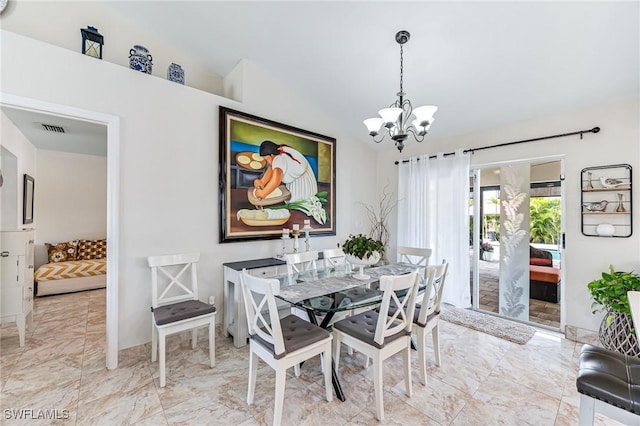 dining room featuring a chandelier