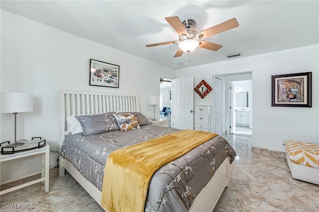 bedroom featuring connected bathroom and ceiling fan