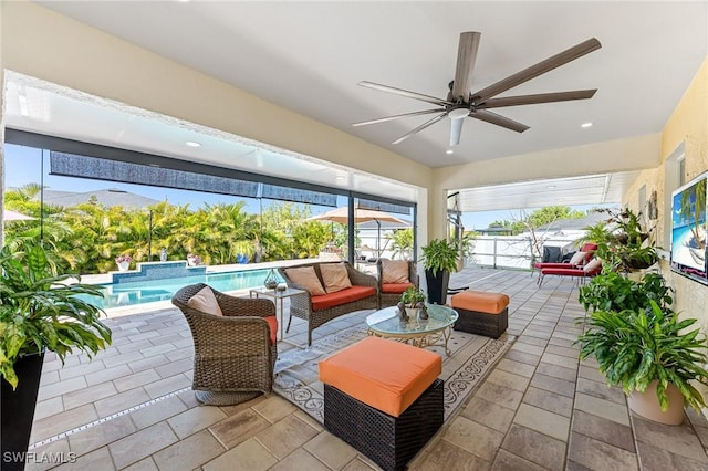 view of patio / terrace with ceiling fan, outdoor lounge area, and a mountain view