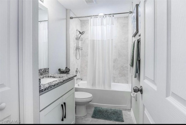 full bathroom with shower / bath combination with curtain, vanity, and toilet