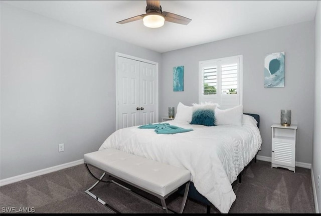 carpeted bedroom with ceiling fan and a closet