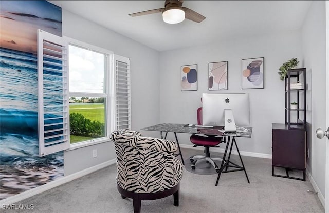 office with light colored carpet and ceiling fan