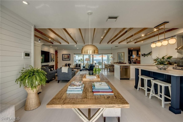 dining area with wood walls