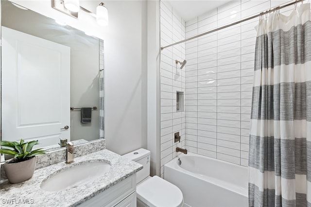 full bathroom featuring vanity, toilet, and shower / bath combo with shower curtain