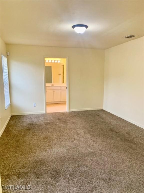 empty room with carpet floors