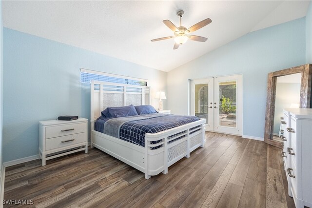 bedroom featuring multiple windows, access to outside, lofted ceiling, and french doors