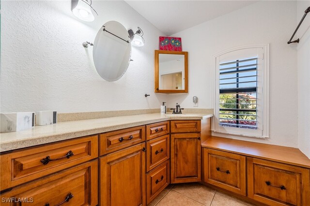 bathroom with vanity and tile patterned flooring