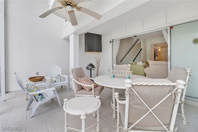 view of patio featuring ceiling fan